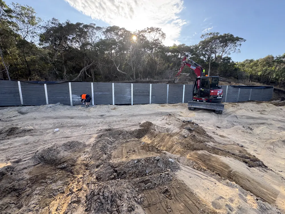 02 – Tall grey wall, bushland build photo 2