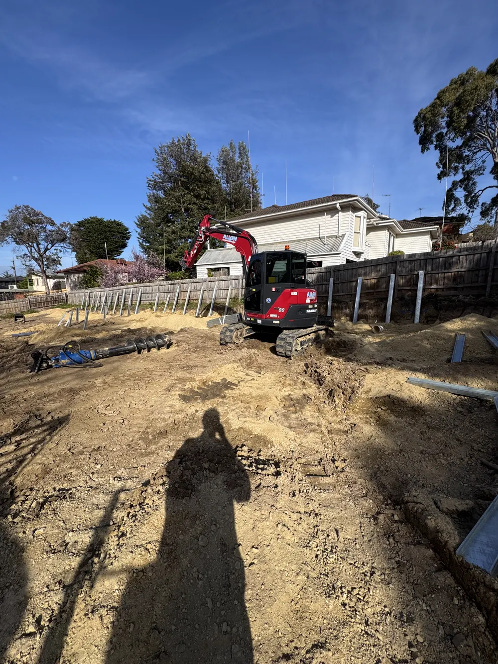06 – Residential build, red excavator photo 5