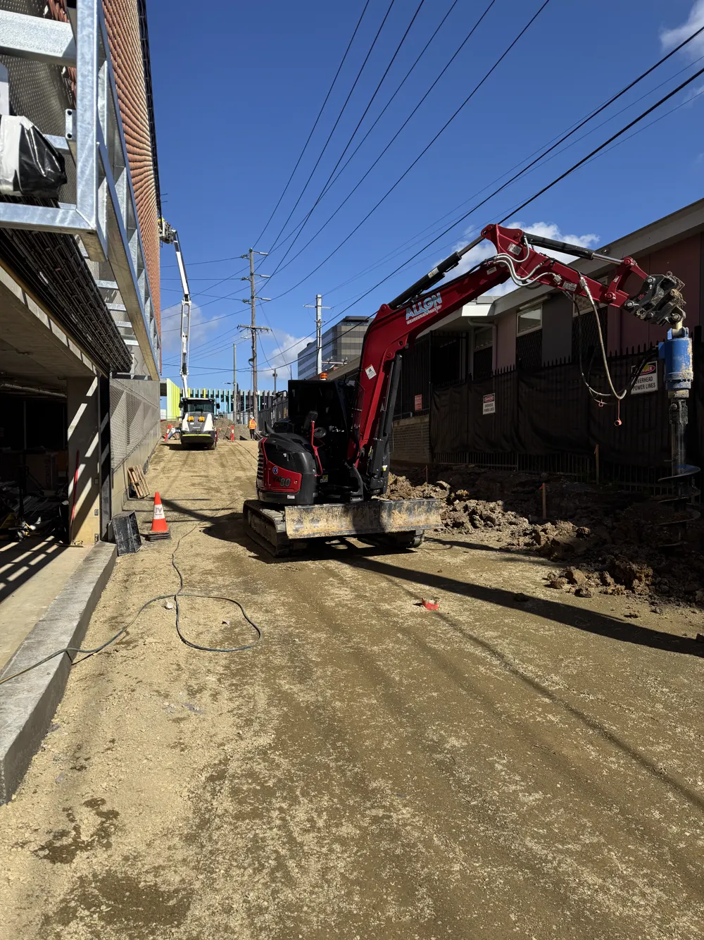 06 – Residential build, red excavator photo 6