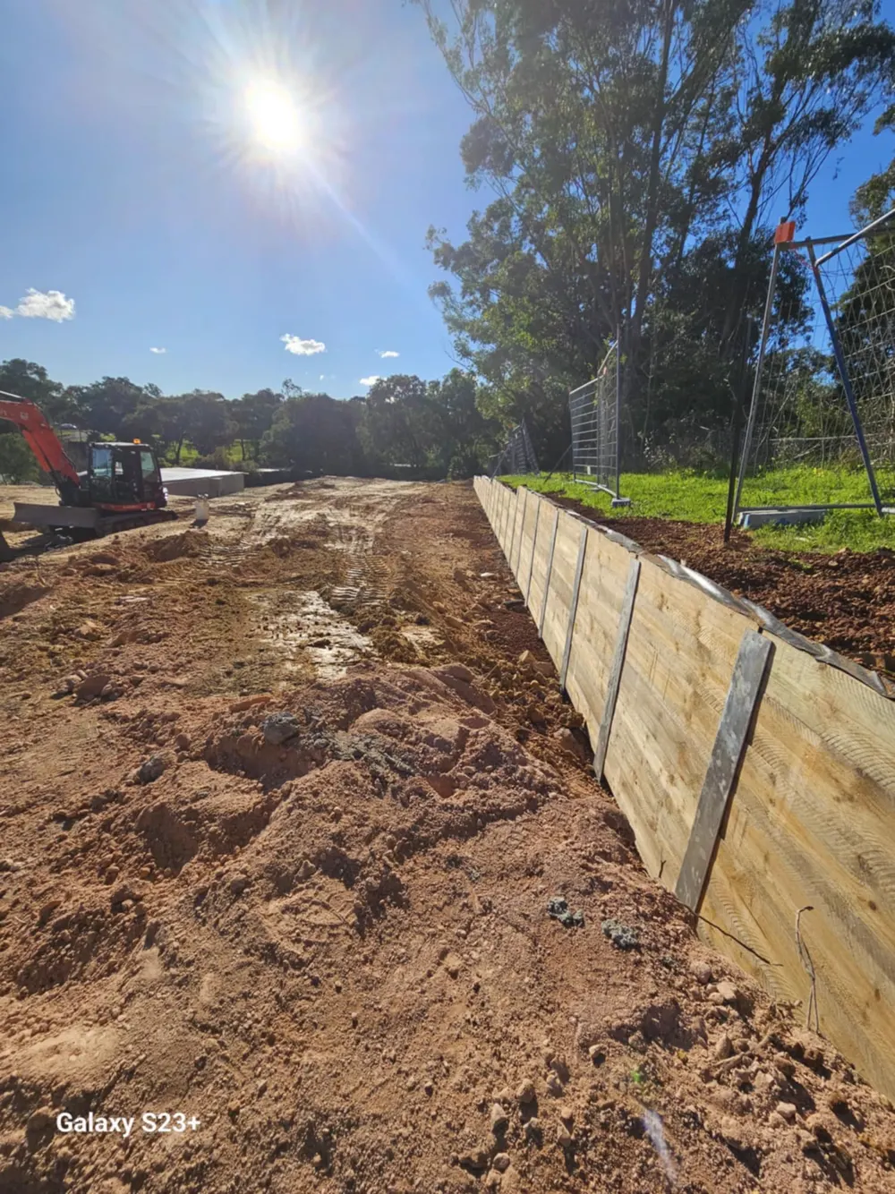 07 – Tan woodgrain wall on slope photo 2