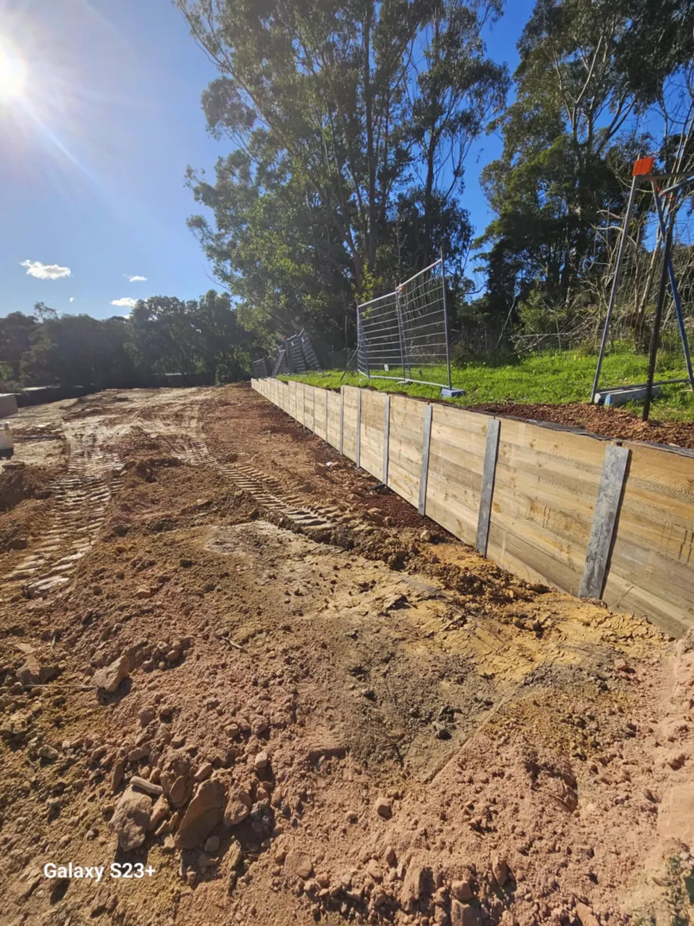 07 – Tan woodgrain wall on slope photo 3