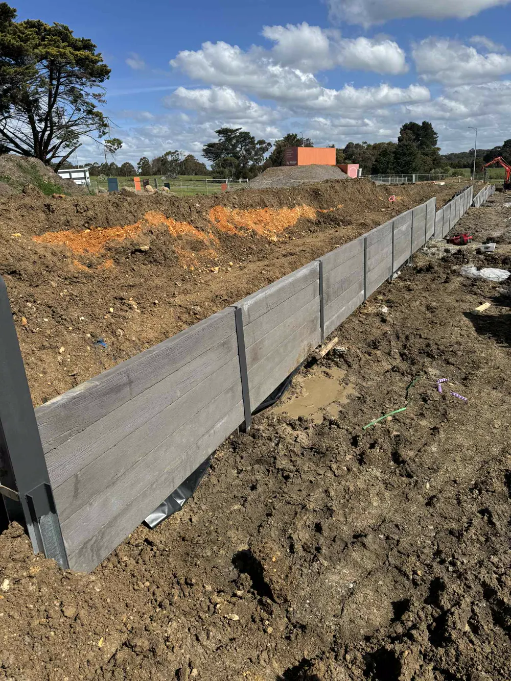 09 – Grey builds on red soil photo 2